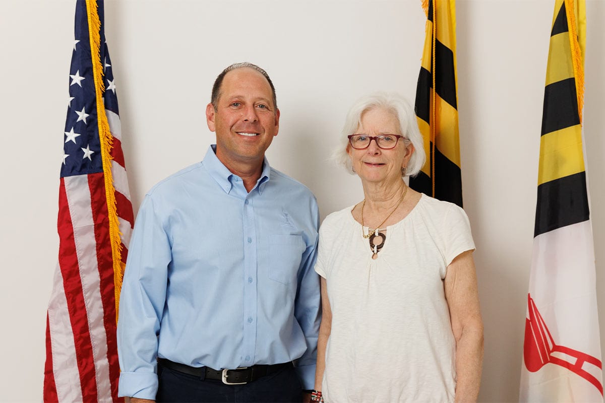 Keith Miller, CEO of Strategic Factory, stands next to Baltimore County Executive, Kathy Klausmeier, to accept appointment to the EDAB
