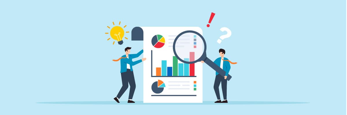 two business men analyzing ROI and data charts with a magnifying glass