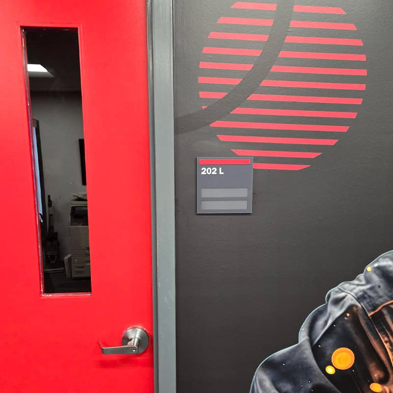 Custom ADA signage fabricated and installed by Strategic Factory