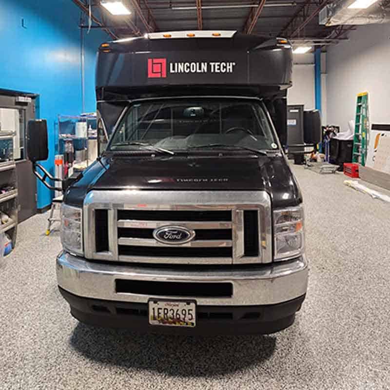 Vinyl truck graphics for Lincoln Tech made by Strategic Factory.