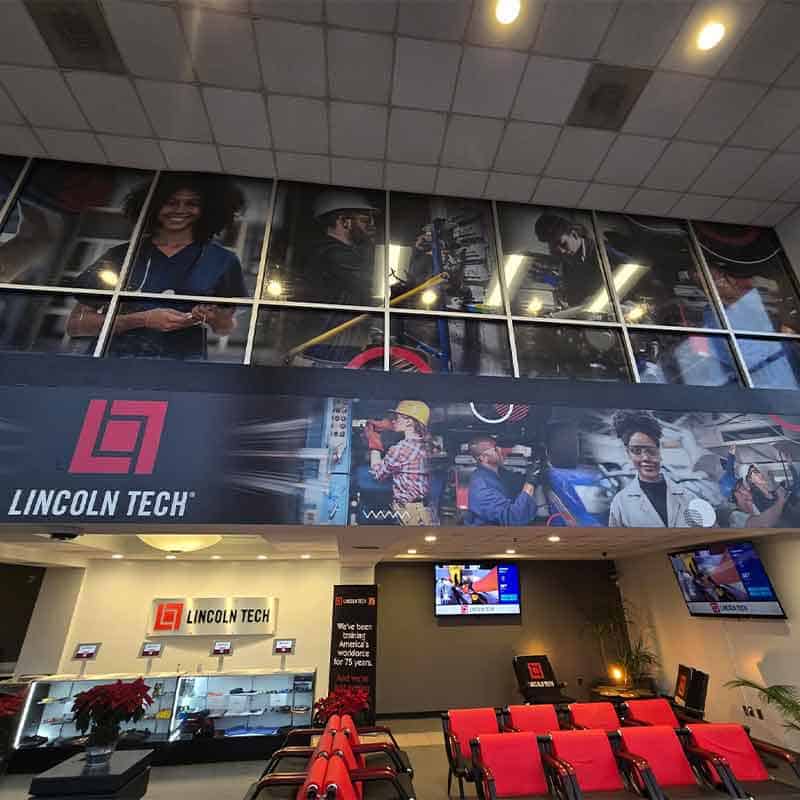Lincoln Tech branded lobby with window and signage from Strategic Factory.