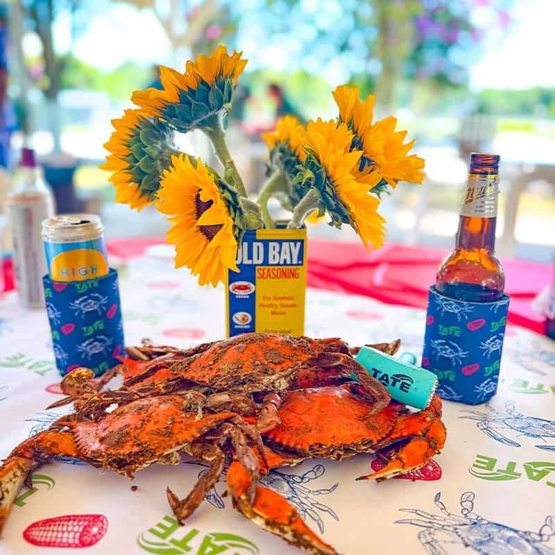 employee appreciation crab feast event with branded koozies made by strategic factory