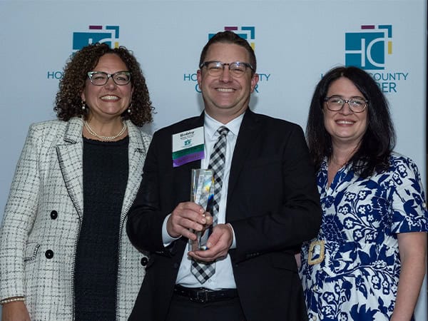 Robert Cardoni, Business Development Direct for Strategic Factory, accepts Ambassador of the Year Award from the Howard County Chamber of Commerce.