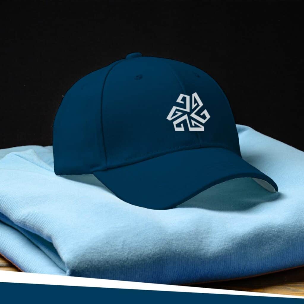 A hat and a blue shirt with a logo on it from Strategic Factory.