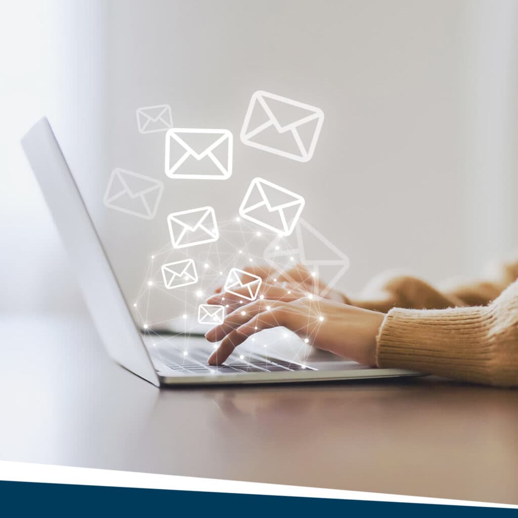Woman typing an email on the computer.