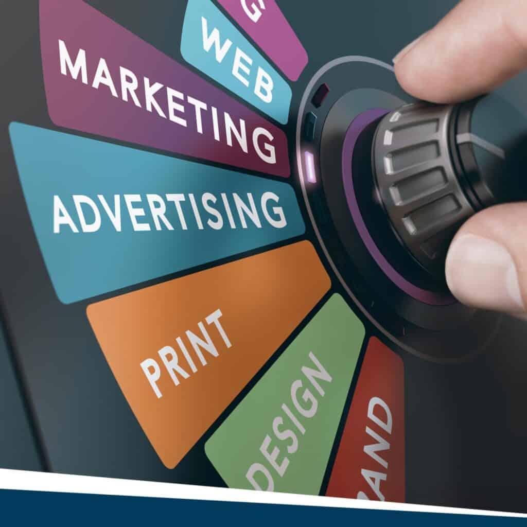 Someone holding a dial with marketing service names to the left.