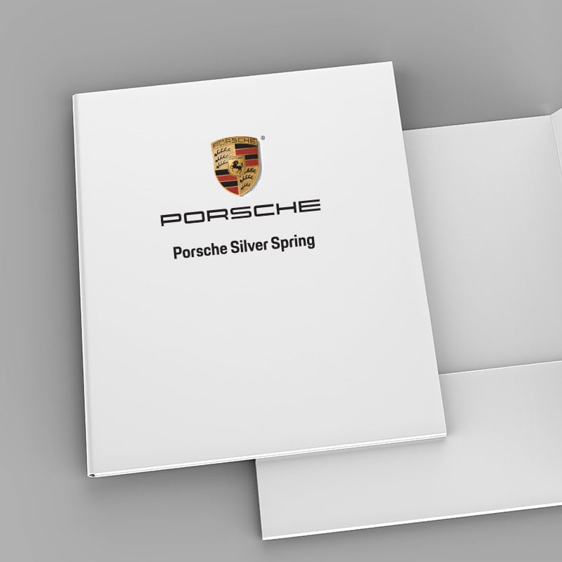 mile one autogroup porsche branded folders