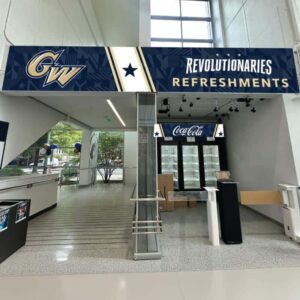GW Revolutionaries athletics concessions stand signage