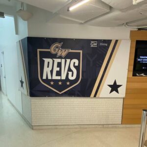 GW Revolutionaries athletics concessions stand signage