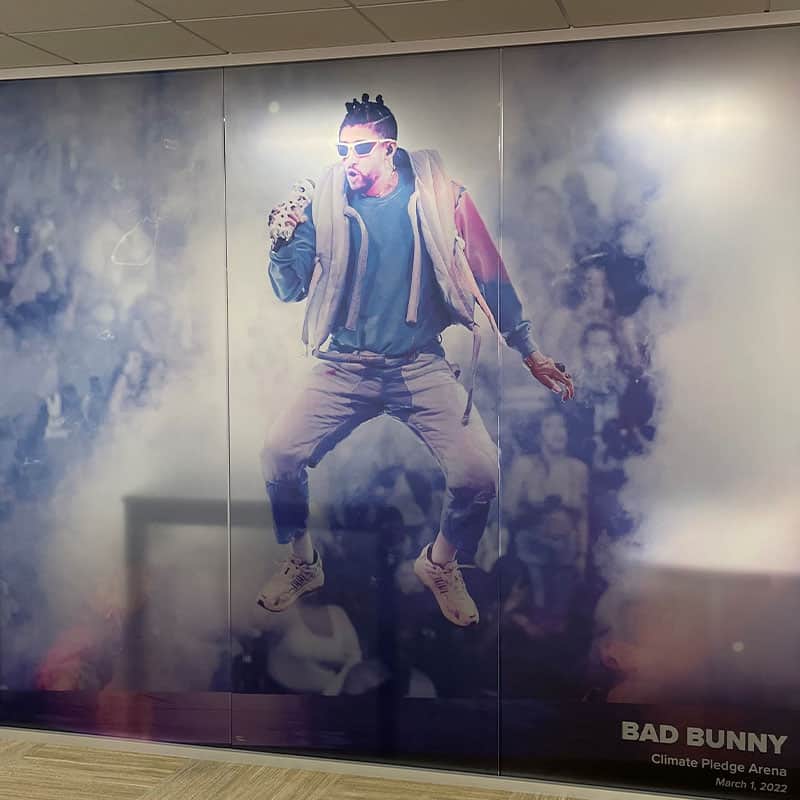 Floor to ceiling wall graphic of Bad Bunny installed at the CFG Bank Arena