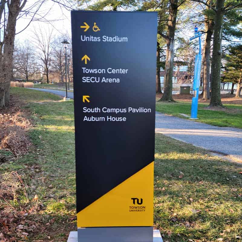 directional pylon sign for university campus pedestrians