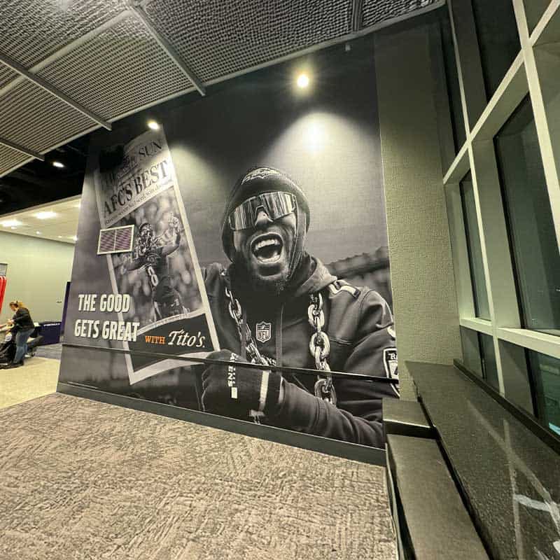 Baltimore Ravens stadium suite-level bar lounge wall wrap with Tito's branding