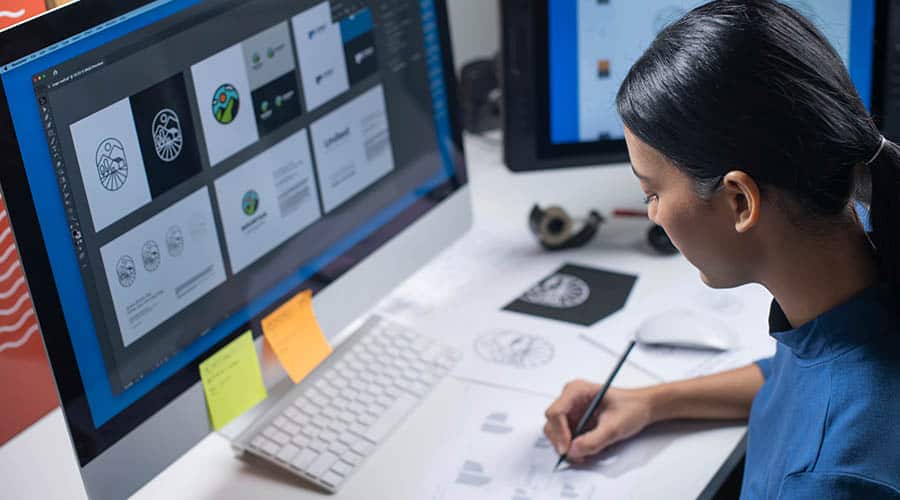 graphic designer designing custom brand logos